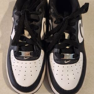 Kids Black and White Nike Sneakers